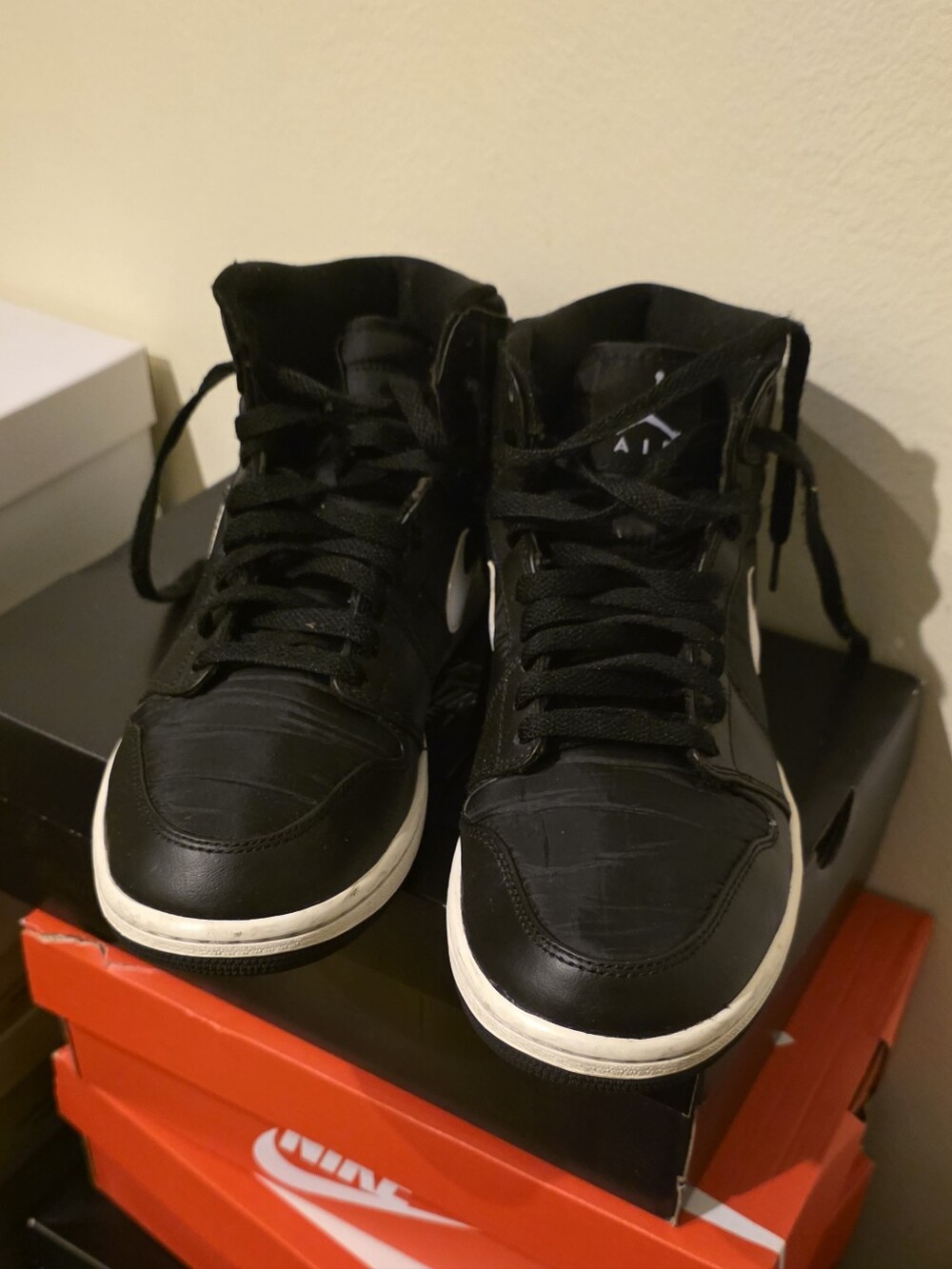 Nike Air Jordans Black and White High-Top Sneakers